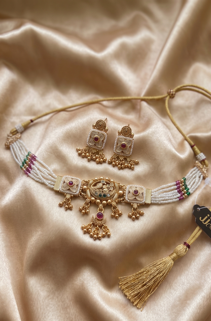 Traditional Antique Gold-Toned Pearl Choker Set with Intricate Carving