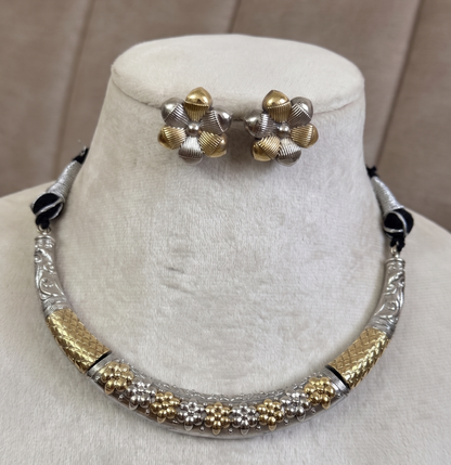 Dual-Tone Floral Bloom Oxidized Hasli Set with matching earrings