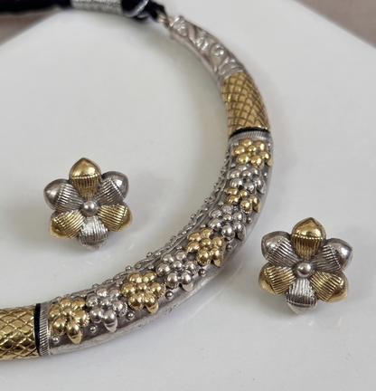 Dual-Tone Floral Bloom Oxidized Hasli Set with matching earrings