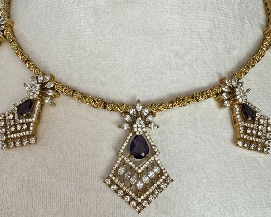 Gold-Plated Geometric Hasli Necklace Set with Purple Teardrop Crystals