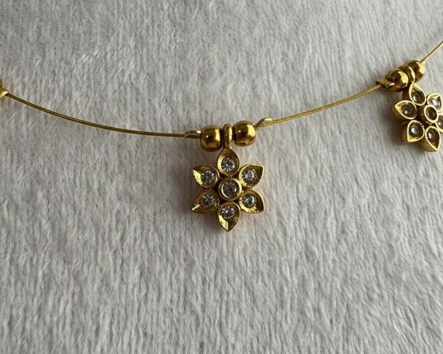Gold-Tone Floating Flower Charm Necklace - Dainty Floral Invisible Wire Choker