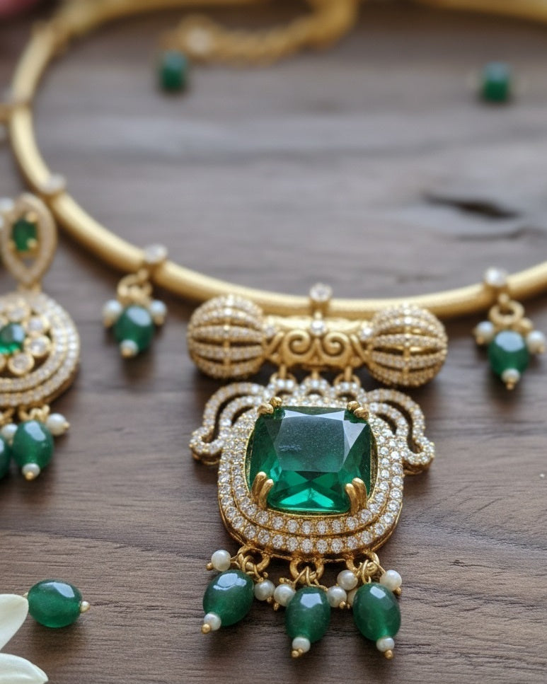 Regal Gold-Plated Statement Choker with Emerald Green Pendant and Pearl Accents