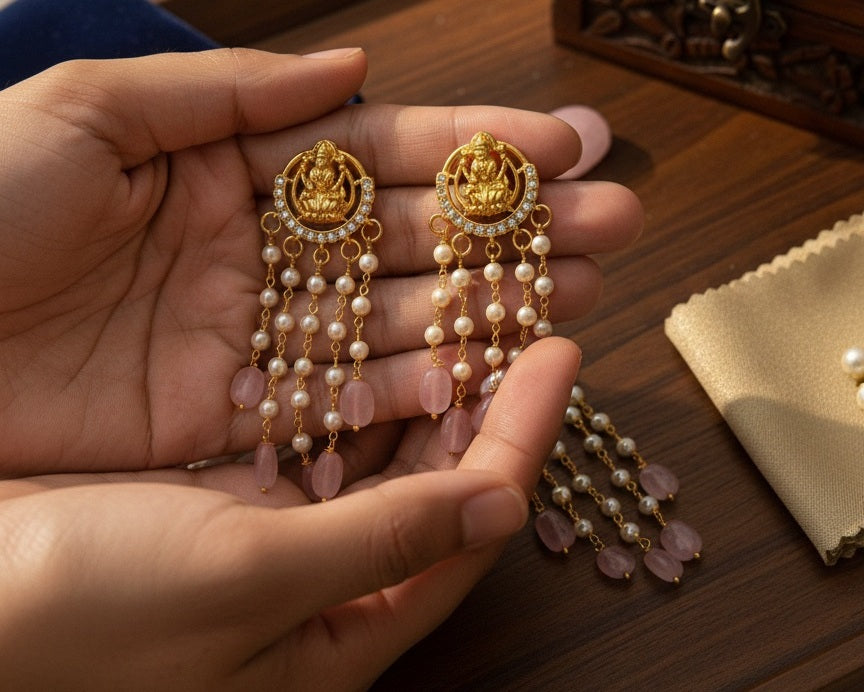 Gold plated Lakshmi Temple drop Earrings with Tiered Pearls and beads