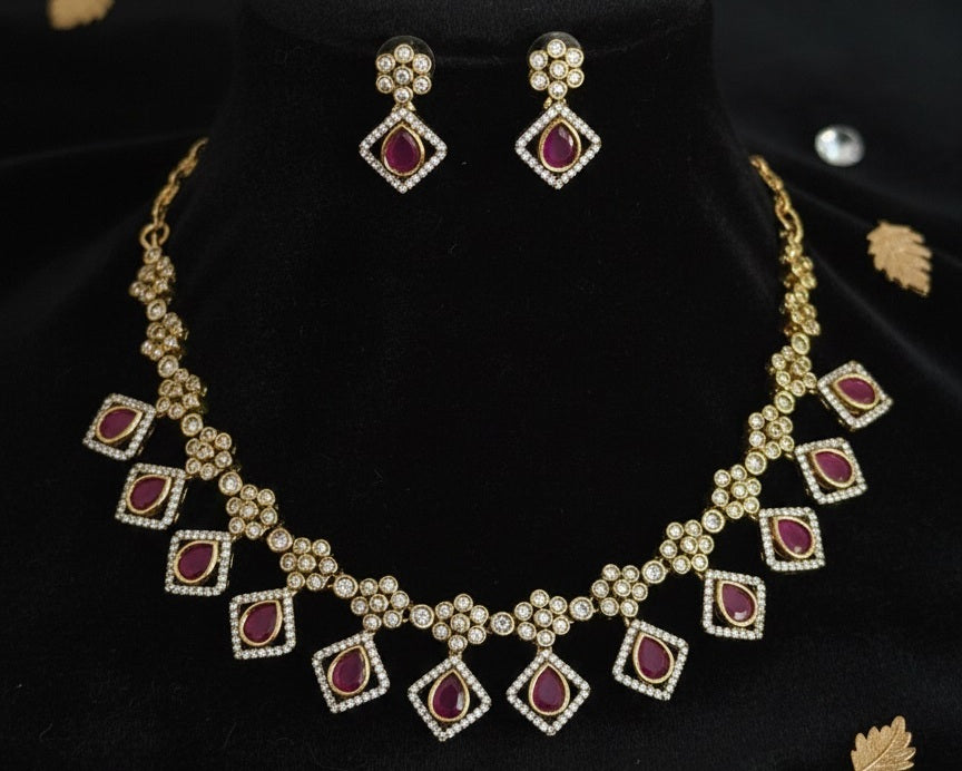 Gold-Plated Geometric Link Choker with Magenta Stone Inlays and Crystal Accents