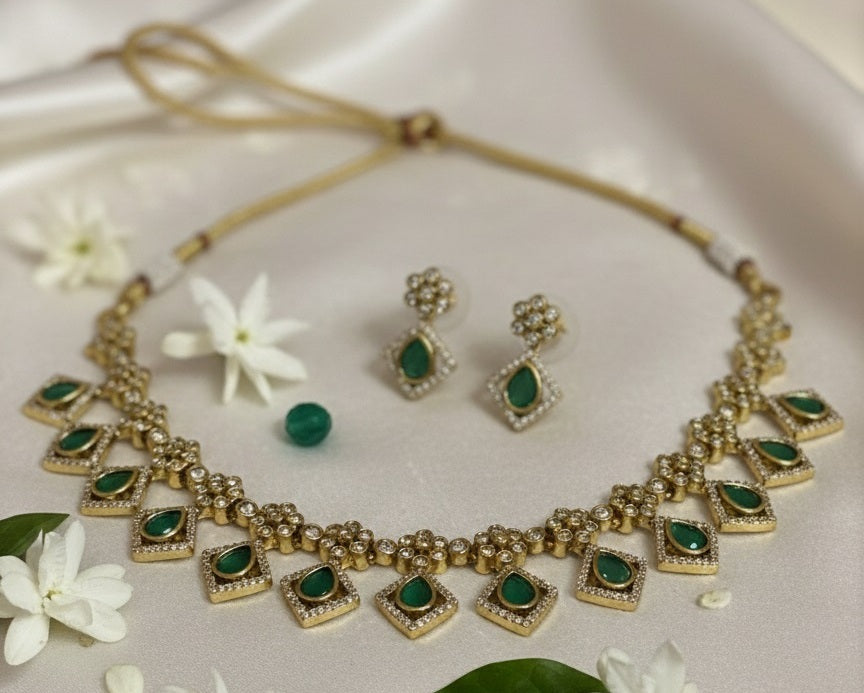Gold-Plated Geometric Link Choker with Emerald Green Inlays and Crystal Accents