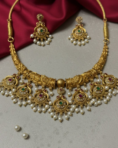 Antique Gold-Plated Peacock Motif Hasli Necklace Set with Kemp Stones and Pearl Droplets