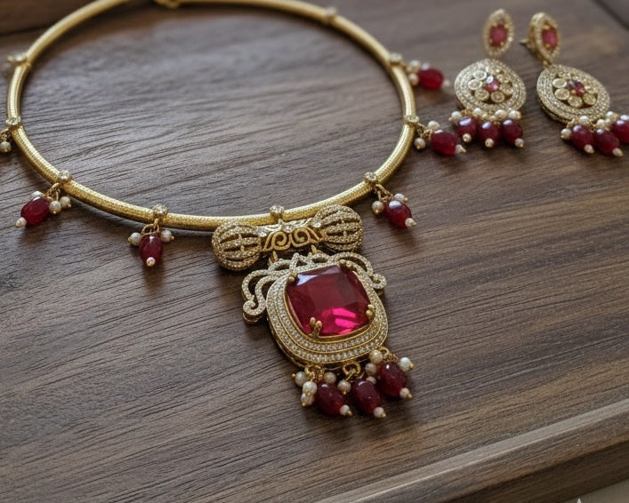 Regal Gold-Plated Statement Choker with Emerald Green Pendant and Pearl Accents