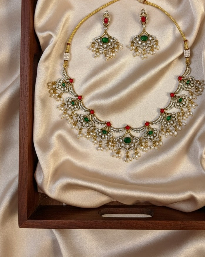 Gold-Plated Kundan Crescent Choker Set with Ruby Red Beads & Emerald Green Stones