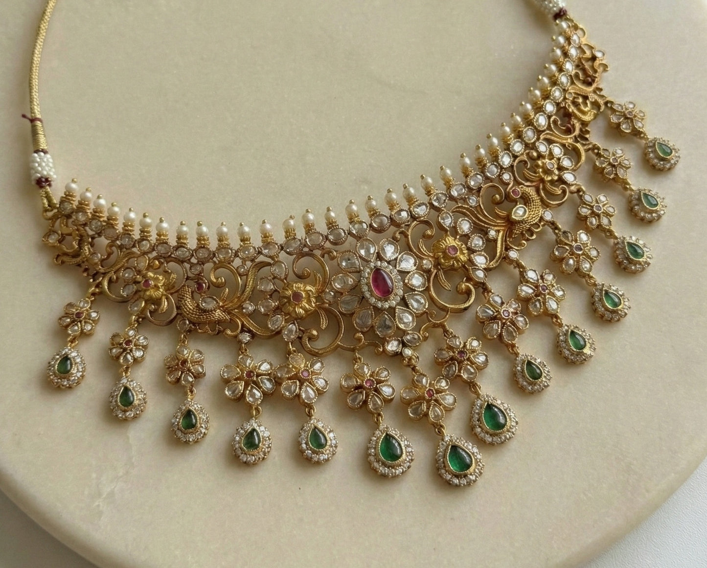 Ratna Riwaz Antique Matte Gold Finish Kundan Choker Set with Green & Ruby Stones | Premium Bridal Jewellery