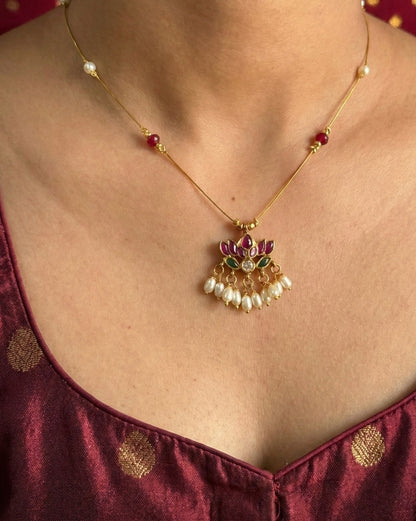 Royal Lotus Floating Necklace – Invisible Chain with Ruby Accents & Pearl Fringe