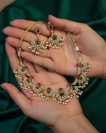 Gold-Plated Kundan Crescent Choker Set with Ruby Red Beads & Emerald Green Stones