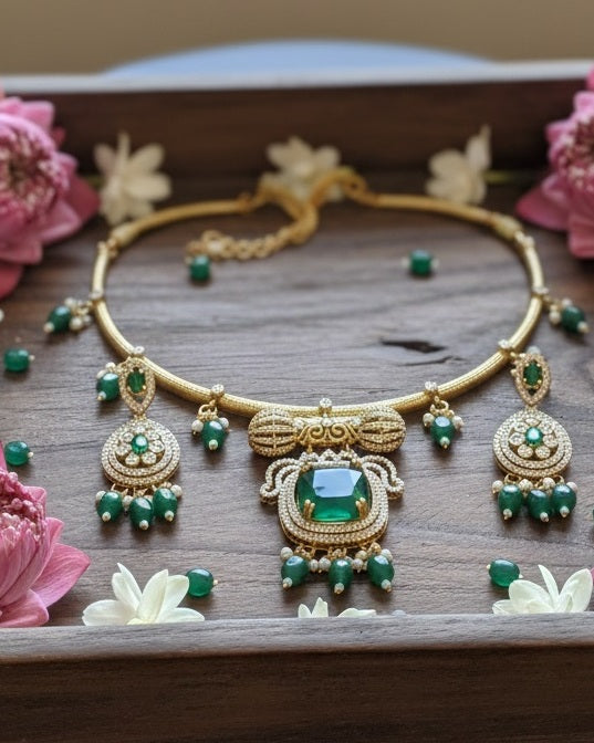 Regal Gold-Plated Statement Choker with Emerald Green Pendant and Pearl Accents