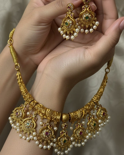 Antique Gold-Plated Peacock Motif Hasli Necklace Set with Kemp Stones and Pearl Droplets
