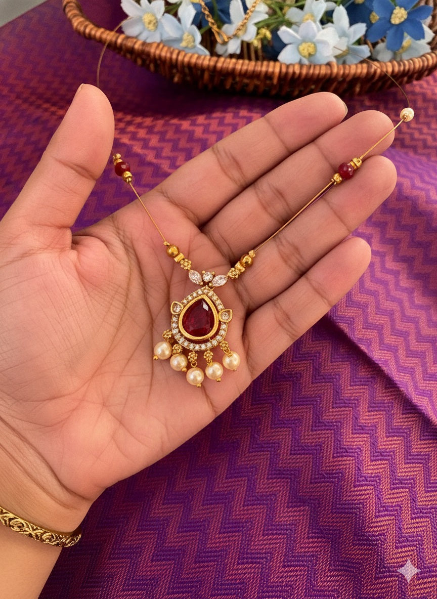 Elegant Ruby Pear Pendant Necklace on Dainty Gold Chain with Pearl Accents