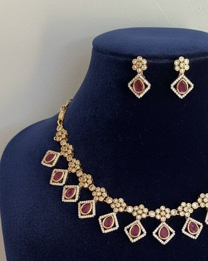 Gold-Plated Geometric Link Choker with Magenta Stone Inlays and Crystal Accents