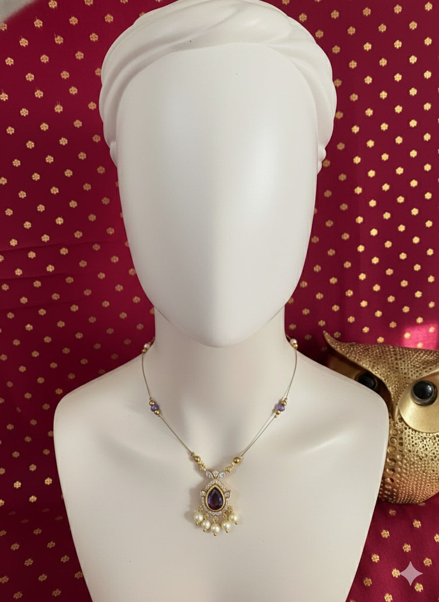 Gold Invisible Chain Necklace with Purple Teardrop Pendant and Pearl Accents