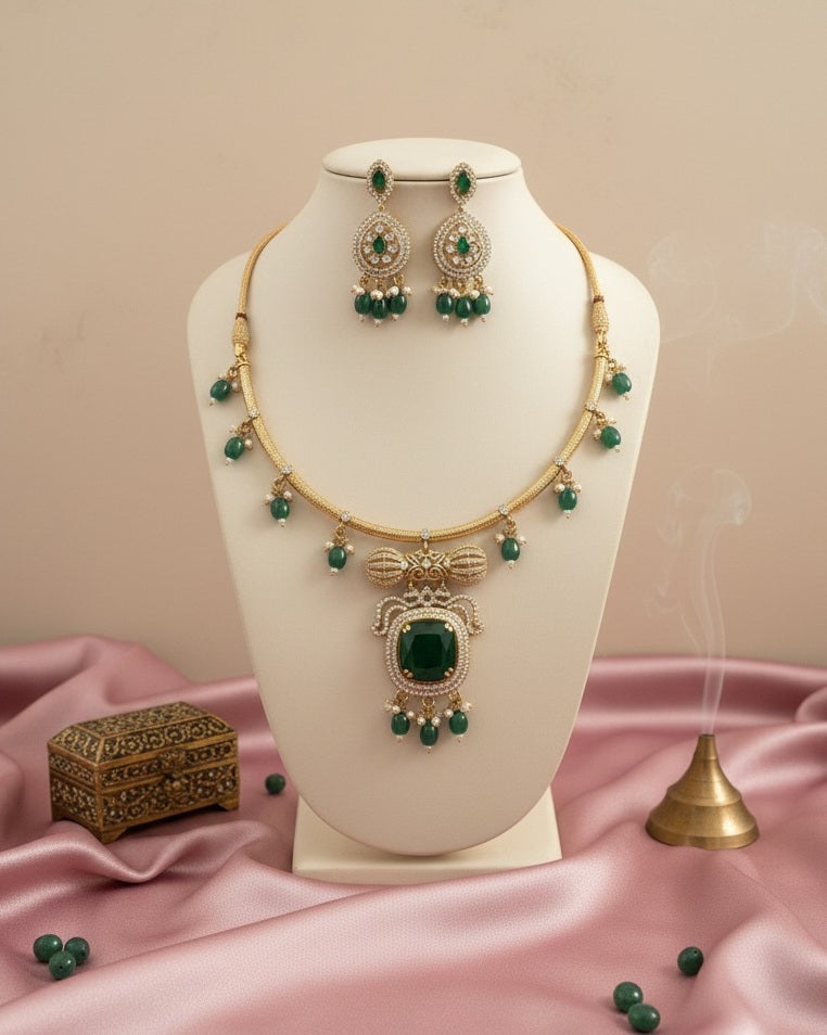 Regal Gold-Plated Statement Choker with Emerald Green Pendant and Pearl Accents