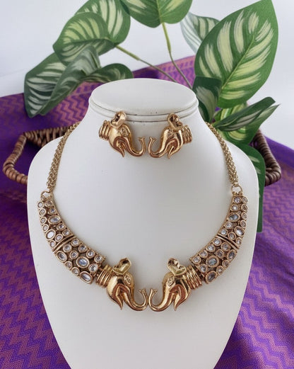 Antique Gold-Plated Elephant Motif Necklace & Earrings Set with Kundan Inlay