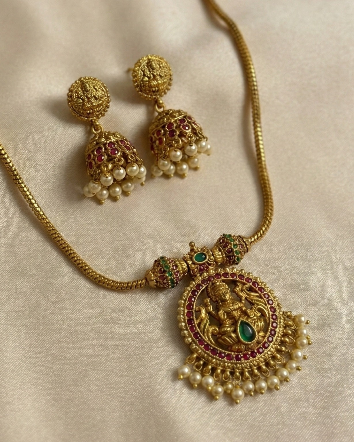 Antique Gold Plated Lakshmi Temple Pendant Set with Kemp Stones & Pearl Clusters (Includes Matching Jhumkas)