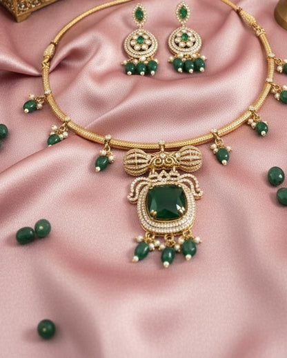 Regal Gold-Plated Statement Choker with Emerald Green Pendant and Pearl Accents