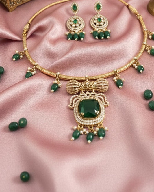 Regal Gold-Plated Statement Choker with Emerald Green Pendant and Pearl Accents