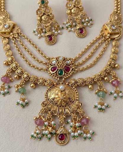 Viraat Heritage Layered Necklace Set – Antique Gold Finish with Temple Motifs & Pastel Beads