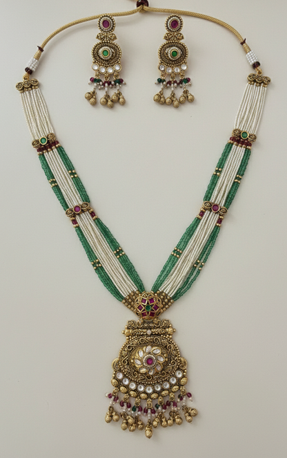 Heritage Multi-Strand Pearl and Emerald Bead Long Necklace Set with Antique Floral Pendant