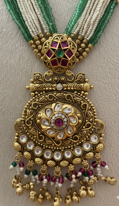 Heritage Multi-Strand Pearl and Emerald Bead Long Necklace Set with Antique Floral Pendant