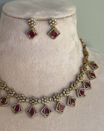 Gold-Plated Geometric Link Choker with Magenta Stone Inlays and Crystal Accents