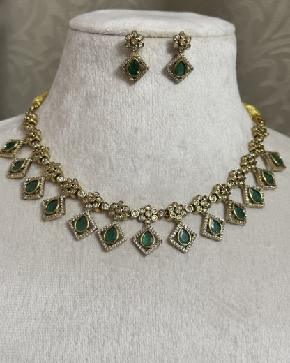 Gold-Plated Geometric Link Choker with Emerald Green Inlays and Crystal Accents