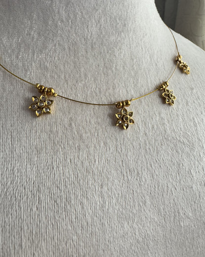 Gold-Tone Floating Flower Charm Necklace - Dainty Floral Invisible Wire Choker