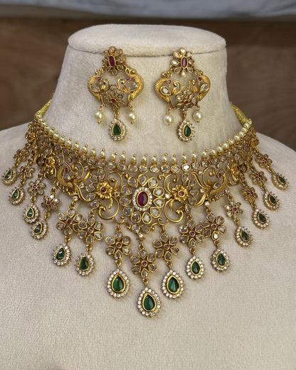 Ratna Riwaz Antique Matte Gold Finish Kundan Choker Set with Green & Ruby Stones | Premium Bridal Jewellery