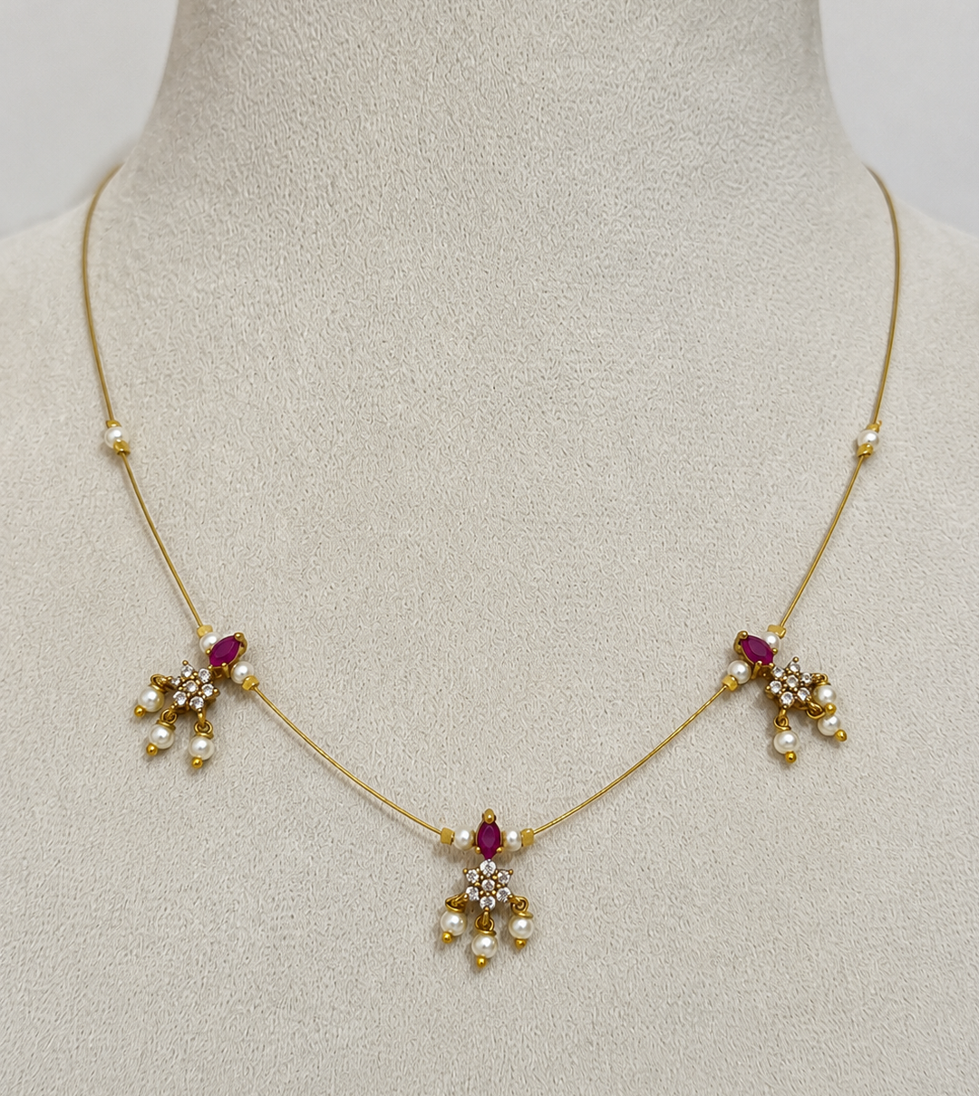 Elegant Invisible Chain necklace with Floral Motif and Pearl Accents