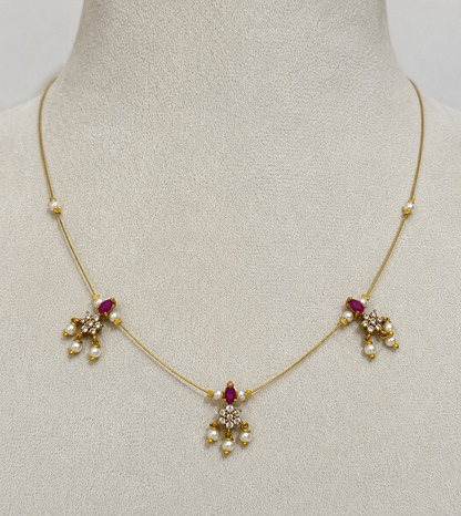 Elegant Invisible Chain necklace with Floral Motif and Pearl Accents