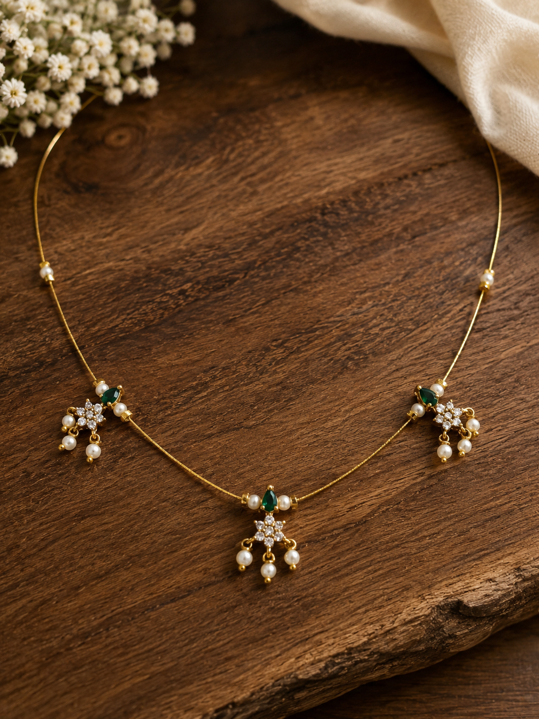 Elegant Invisible Chain necklace with Floral Motif and Pearl Accents