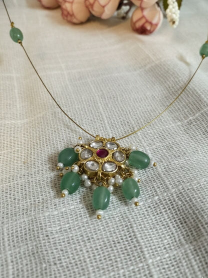 Trendy Invisible chain in Jadau Kundan without Earrings | Handcrafted Oval Floral Pendant Necklace with white kundan stone, Green Beads & Pearl Accents