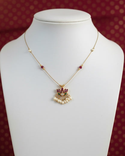 Royal Lotus Floating Necklace – Invisible Chain with Ruby Accents & Pearl Fringe